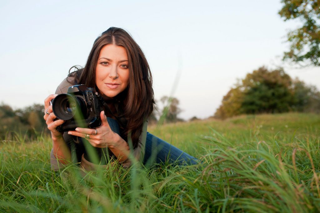 A mom shooting low in the grass