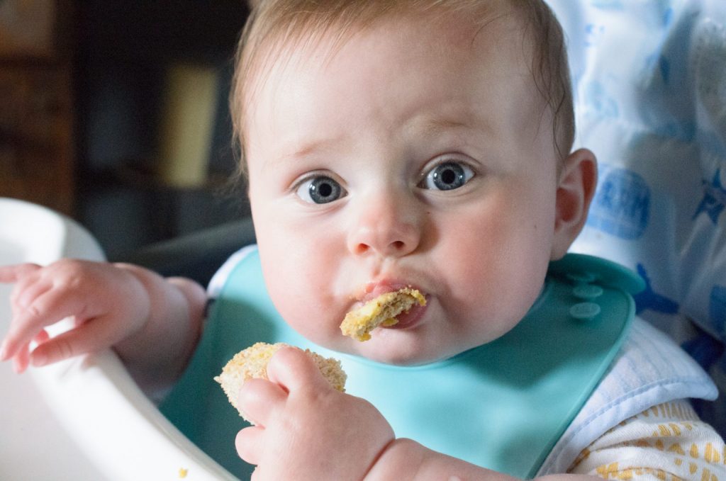 My daughter Cara, eating toast.